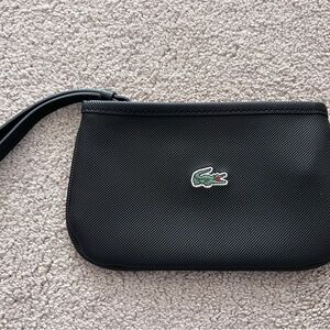 Lacoste Black Wristlet Pouch – Textured PVC with Grid Interior